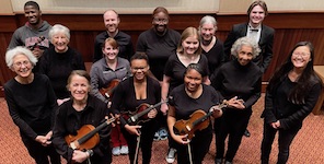 Pictured in the lobby of the Laidlaw Performing Arts Center are members of the USA Strings.