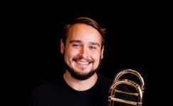 Pictured is USA faculty trombonist Dr. Arie VandeWaa.