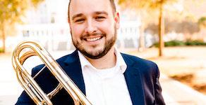 Pictured is USA faculty trombonist Dr. Arie VandeWaa.