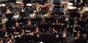 Pictured on the Saenger Theatre stage is the USA Symphony Band.