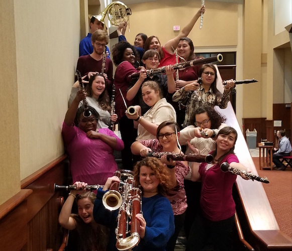 Pictured in the lobby of the Laidlaw Performing Arts Center are members of the USA Woodwind Ensembles in a moment of levity. data-lightbox='featured'