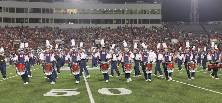 2015 Jaguar Drumline on the field in uniform