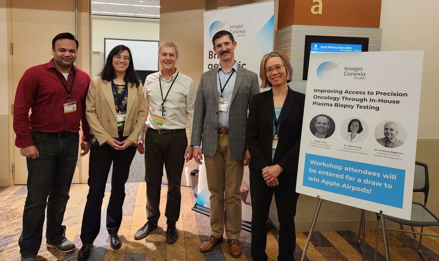 Thuy Phung, M.D., Ph.D., far right, spoke at a corporate workshop during the Association for Molecular Pathology annual meeting.