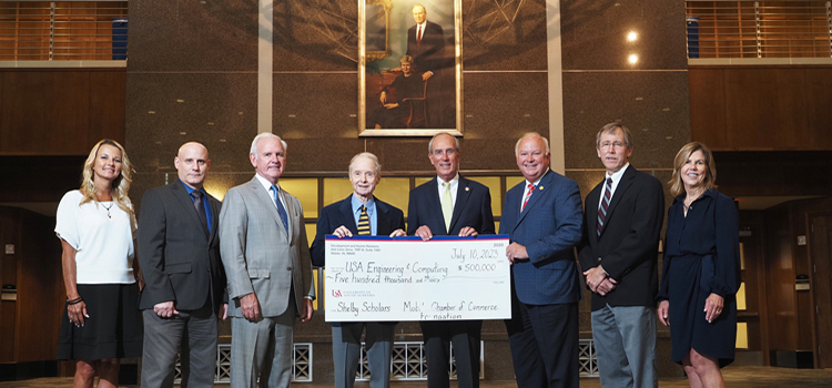 The Mobile Area Chamber of Commerce Foundation raised $250,000 to establish the Senator Richard Shelby and Dr. Annette Shelby Endowed scholarship in engineering and computing. The gift qualifies for matching funds from the Mitchell-Moulton Scholarship Initiative, bringing the total amount to $500,000. Recipients will be known as Shelby Scholars. From left, Dr. Andi Kent, USA executive vice president and provost; Dr. Todd Andel, School of Computing dean; Bradley Byrne, Mobile Chamber of Commerce CEO; Abraham "Abe" Mitchell; Mobile Mayor Sandy Stimpson; Jo Bonner, USA president; Dr. John Usher; College of Engineering dean; Margaret Sullivan, vice president of development and alumni relations.