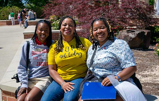 Student with family at USA Day,