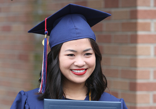 South graduate in cap and gown.