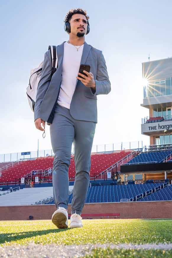 Devin Volsin walking on the football field.