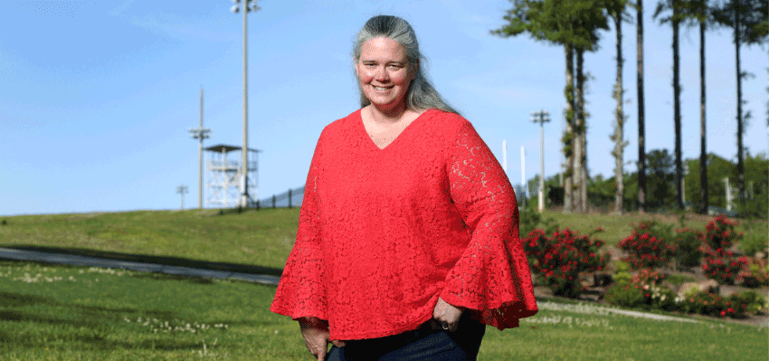 Avalisha Fisher standing outside.