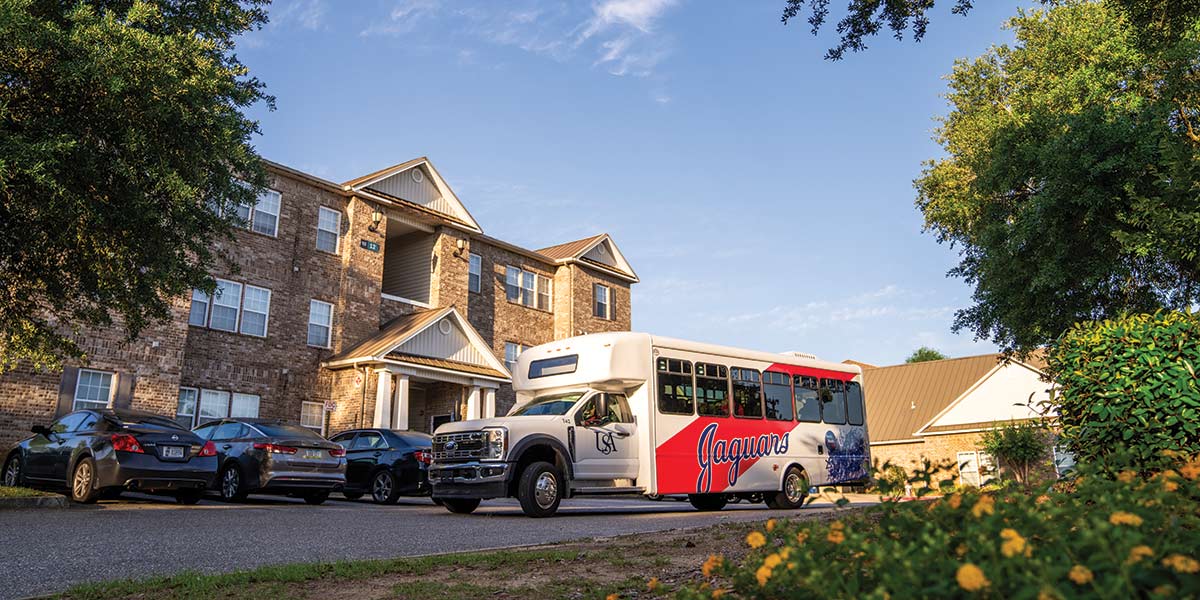 Jag bus in front of SouthPaw Village.