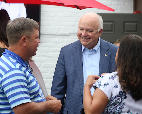 President Bonner speaking with alumni at Takeover Tuesday.