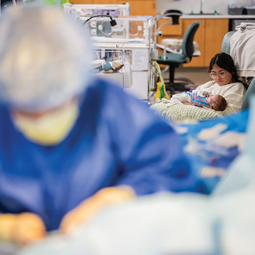 Mother holding her baby