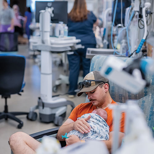 Father holding his baby