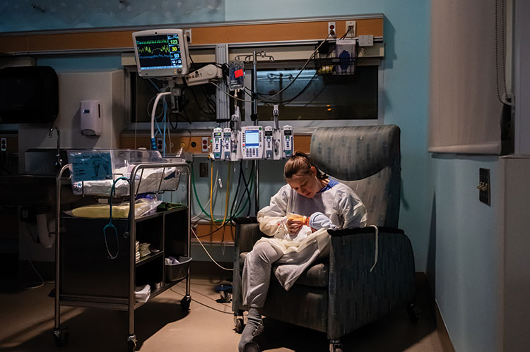 Mother feeding her baby