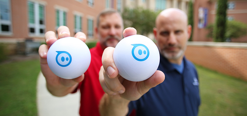 Dr. Todd McDonald and Dr. Todd Andel in front of Shelby Hall