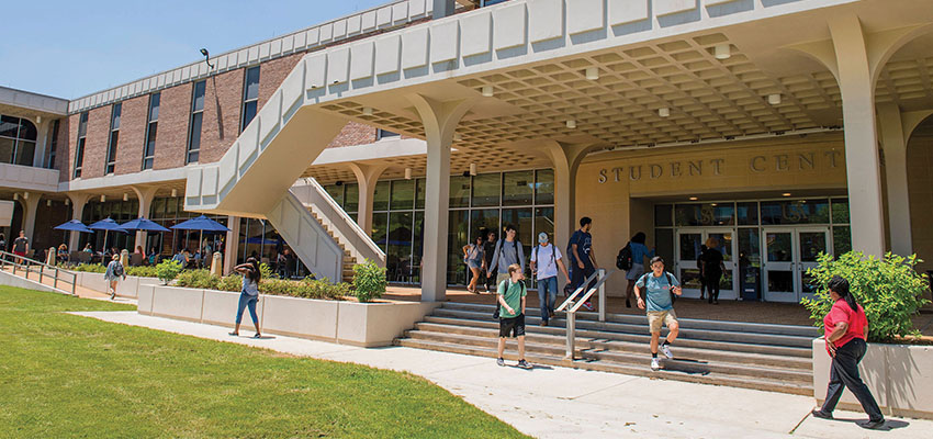 Student Center with students walking in front of it.