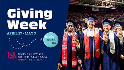 Facebook graphic with students at graduation holding up J sign.