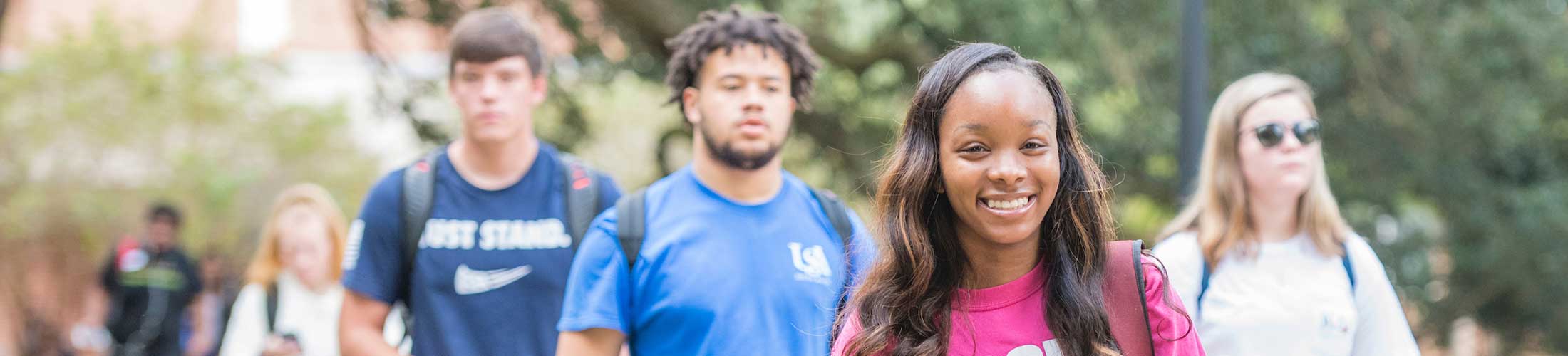 USA Students walking on campus between classes.