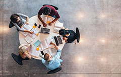 Students Studying Around Table