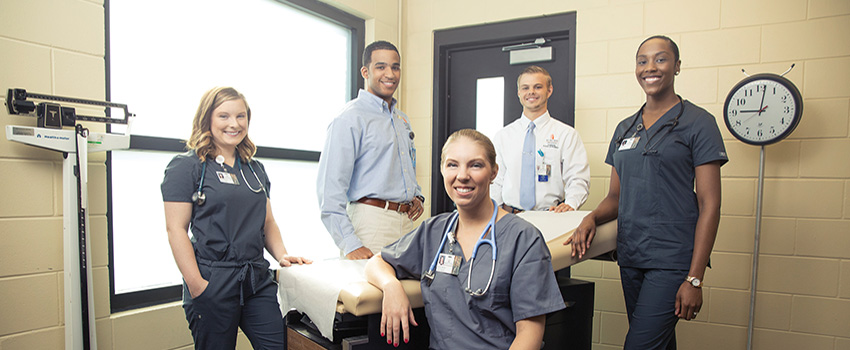 Image of two female and male medical students