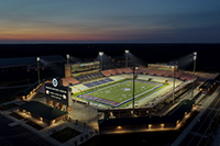 media relations photography - Hancock Whitney Stadium Aerial View with lights on