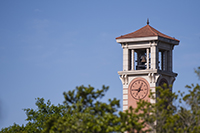 media relations photography - Moulton Tower Clock and Bells above the tree tops