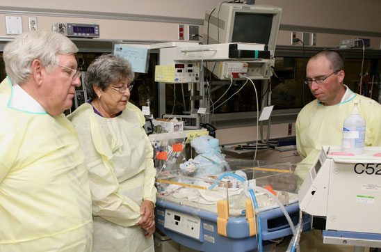 USA President Gordon Moulton, USA C&W Hospital Administrator Becky DeVillier, and Enterprise physician Dr. Scott Charlton