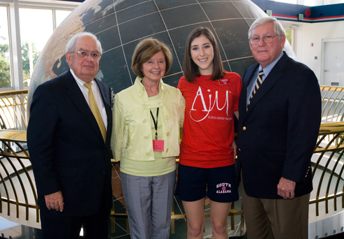 Dr. Carl Moore, Geri Moulton, Lauren Gessner, and President Gordon Moulton