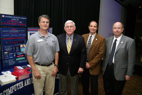 Dr. Bob Sweeney, President Gordon Moulton, Dr. Alec Yasinsac, and Dr. David Johnson