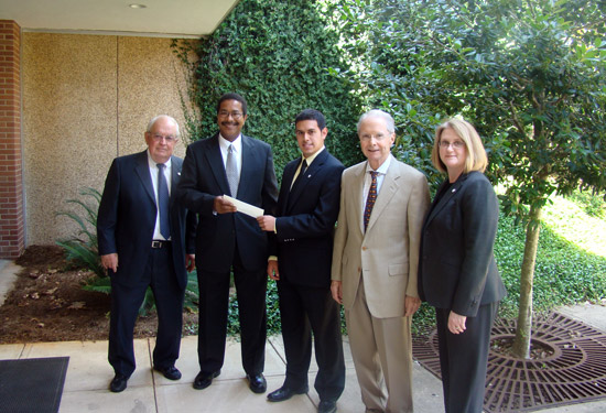 USA Mitchell College of Business Dean Dr. Carl Moore, Kenny Sylvester, Joel Ponce, Abraham Mitchell, and USA Mitchell College of Business Associate Dean Dr. Deborah Spake.