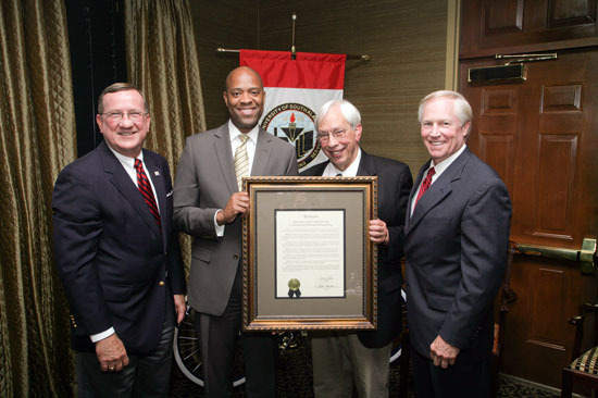 At the recent USA Board of Trustees meeting are from left, USA Vice President of Development and Alumni Relations Dr. Joseph Busta; USA Dean of Students  and 2011 Faculty Staff Annual Fund Co-Chair Dr. Michael Mitchell; USA Department of Orthopedics Chair and Professor and 2011 Faculty Staff Annual Fund Co-Chair Dr. Fred Meyer; and USA Board of Trustees Chair Jim Yance. 