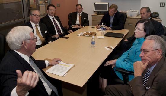 University of South Alabama President Gordon Moulton makes a point in a recent meeting with leaders of the Alabama Legislature in which the University thanked lawmakers for $3 million in additional state support this year for the USA Mitchell Cancer Institute. Shown clockwise from lower left are Moulton; Rep. Jim Barton, R-Mobile, chairman of the House Ways and Means General Fund Committee; Rep. Jay Love, R-Montgomery, chair of the House Ways and Means Education Committee; USA legislative liaison Happy Fulford; George Talbot of the Press-Register; House Speaker Mike Hubbard, R-Auburn; Rep. Jamie Ison, R-Mobile, chair of the Mobile House delegation; and Rep. Victor Gaston, R-Mobile, House Speaker Pro Tempore. In addition to conducting cancer research, the USA Mitchell Cancer Research Institute this year treated more than 6,000 individual patients representing 55,000 patient treatment sessions. The USAMCI is the only academic cancer research center on the upper Gulf Coast. 
