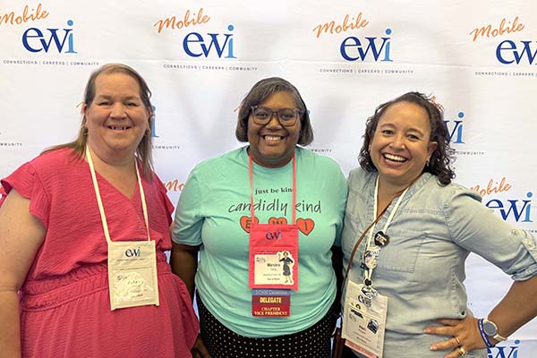 Three women at conference