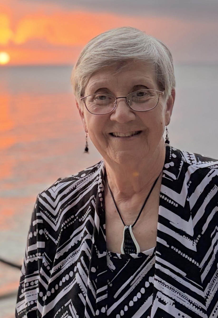 Cathy O'Keefe with sunset in the background