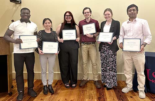Six graduate students hold certificates