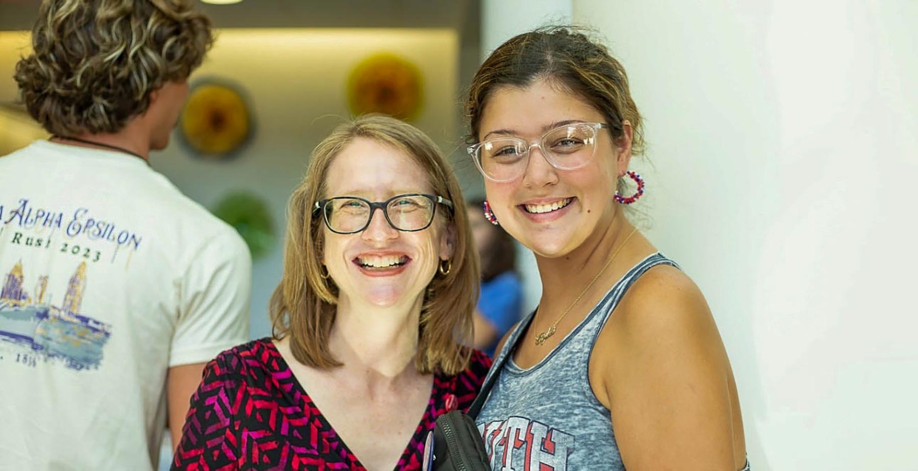 Lauren Morse smiles for a photo with Dr. Susan Gordon-Hickey during a College of Allied Health Professions event at the University of South Alabama. data-lightbox='featured'