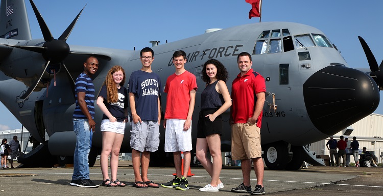 USA meteorology students, from left, Kashawn Sinkler, Peyton Barlow, Cameron Young, Adam Olivier, Alysa Carsley and Jonathan Chance toured a Hurricane Hunters plane during the Gulf Coast Hurricane Awareness Tour on May 19 at Brookley Field. 