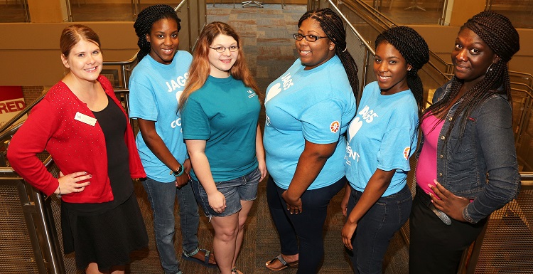 Several of the Members of the Sexual Assault and Violence Educators team, known as SAVE, attend the first session of the Girls’ Night Out, violence prevention program held in the Student Center Ballroom. From left are Courtney Diener, Title IX and violence prevention and education specialist, Bria Scott, nursing major; Candace Wilkerson, psychology major; Aisia Snow, speech and hearing major; Taylor Scott and Kadijah Oliver, both professional health science majors.