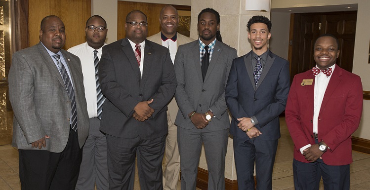 University of South Alabama Collegiate 100 members gather with their mentors from the 100 Black Men of Mobile Inc. From left are Dr. Andre Green, mentor and associate dean in the College of Education; Broderick Morrissette; Marlon Jones; Collegiate 100 mentor and adviser Dr. Michael Mitchell, vice president for Student Affairs and dean of students; Jerod Coleman; Derek Pickett and JuWan Robinson.