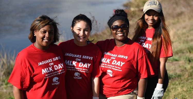 University of South Alabama students participate in a clean-up project Monday as part of the MLK Day of Service.  data-lightbox='featured'