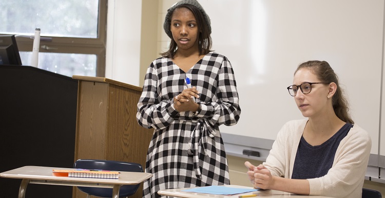 Ashlyn Cohen, left, and Lydia Turner help lead a session on the Declaration of Independence and equality during Monday's 'teach-in' held in commemoration of Dr. Martin Luther King Jr.