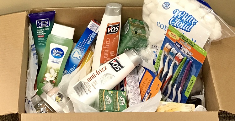 box filled with donated toiletries and miscellaneous personal items for distribution to tornado victims 