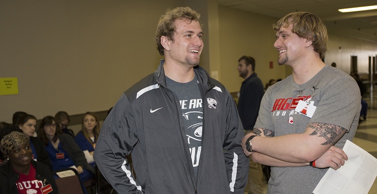 Twin brothers Daniel, left, and Caleb Butler were among several hundred South volunteers at the this year's Project Homeless Connect. Volunteers served and supported nearly 300 homeless individuals.