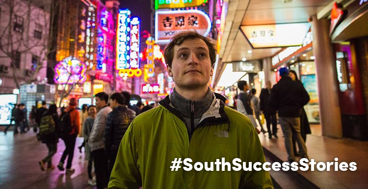 Drew Yates' College of Engineering degree from USA has become his ticket to see the world.  Here, he's taking in the sights of Shanghai, China, where he and his co-workers from Prism Systems, Inc., were developing software for a theme park.  data-lightbox='featured'