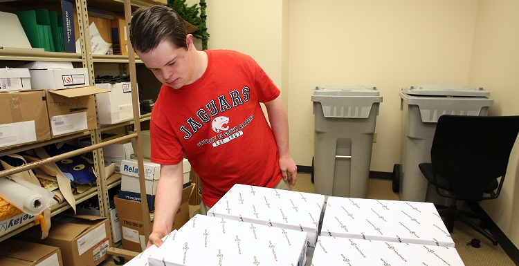 Benjamin Pelham, who is taking courses at South through PASSAGE USA, works part-time in the Registrar’s Office. 