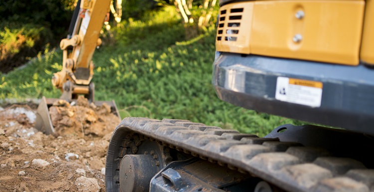 heavy equipment engaged in digging 