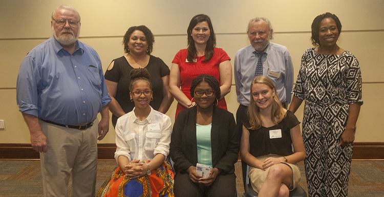 The finalists of the USA Public Speaking Contest are, seated from left, third place winner Faith Wheeler of Murphy High School; first place winner Siddiqah Abdullah of Murphy High School and second place winner Marie Doyle from the Alabama School of Mathematics and Science. Standing from left are USA communications faculty Dr. Reggie Moody, associate professor; Katherine Rigsby, instructor; Megan Sparks, senior instructor; Dr. James Aucoin, professor and chair; and Dr. April Dupree Taylor, assistant professor.