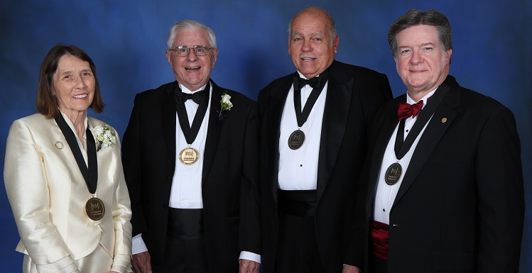 The USA National Alumni Association recognized five members of the South community on Thursday for outstanding achievements. From left are Dr. Pat C. Covey, founding dean of USA’s Pat C. Covey College of Allied Health Professions; Lee Covey, founder of the Collegiate Housing Foundation; James L. “Jim” Busby, ’83, founder of Drobotik Sciences; and Dr. John S. Meigs Jr., ’79, president of the American Academy of Family Physicians. Not pictured is retired U.S. Coast Guard Vice Admiral William “Dean” Lee, '79.