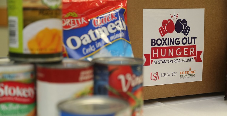 Canned food for Boxing Out Hunger. Through phase one of the Boxing out Hunger program, the Stanton Road Clinic will distribute 1,000 healthy pre-packaged boxes to food insecure patients that contain an assortment of shelf-stable ingredients such as canned produce, protein, dairy and grains.