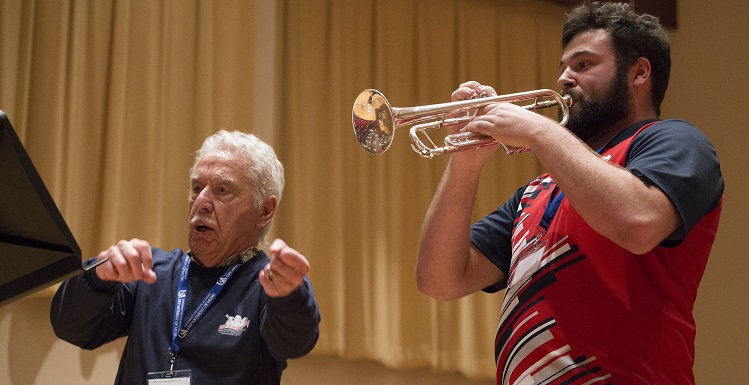 Erick Wricklund, right, a junior music major at the University of South Alabama, plays under the direction of Doc Severinsen, the longtime 'Tonight Show' bandleader. "The man is a legend," Wricklund said. "I learned a lot from it."