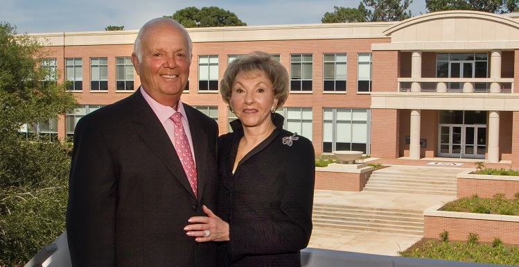 Herbert A. Meisler has donated $5 million to expand the USA Medical Center’s Trauma Center, which will be renamed the Fanny R. Meisler Trauma Center. Here, the couple stands in front of Meisler Hall shortly after its construction. 